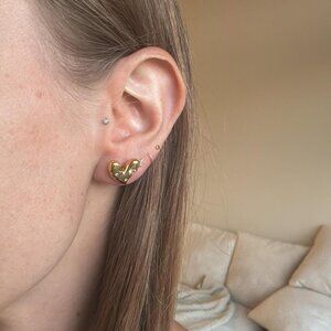 The Alyssa Gold heart studded cz stud earrings love